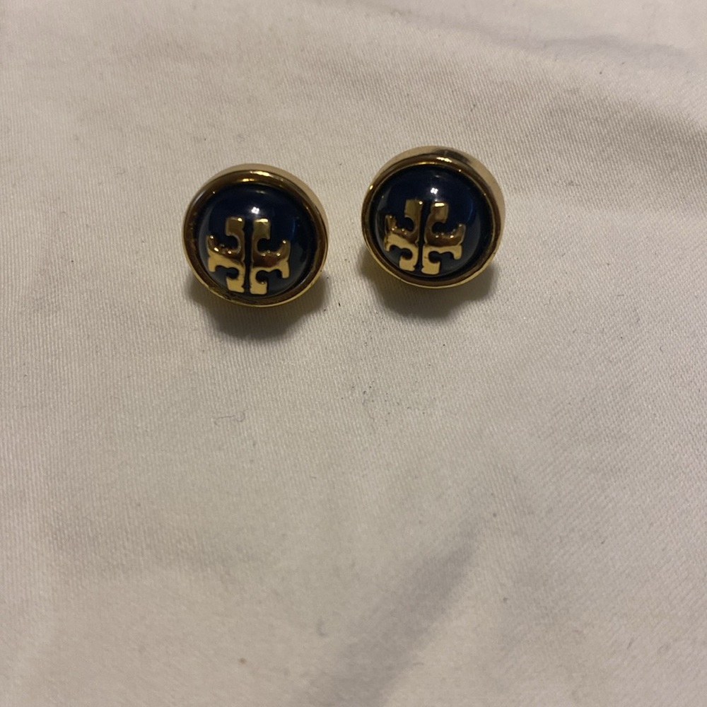 Gold and black enamel Tory Burch studs